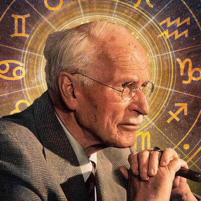 Fotografía de Carl Jung junto a los signos zodiacales